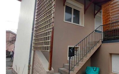 Ecothermic pose de panneaux isolants 32 mm, finition crépi quartz brun et craie blanche à Aurillac