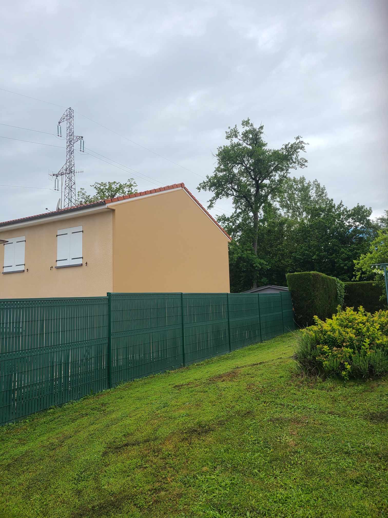 Système d'isolation par l'extérieur Ecothermic : Façade imitation crépi en terre brune à Aurillac