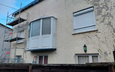 Ecothermic pose de panneaux isolants 32 mm, finition crépi quartz brun et craie blanche à Aurillac