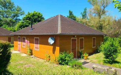 Ecothermic Aurillac : Solution UNISO 32 pour l'ITE de leur maison avec une finition clin lisse chêne doré à Ségur-des-Villas dans le Cantal